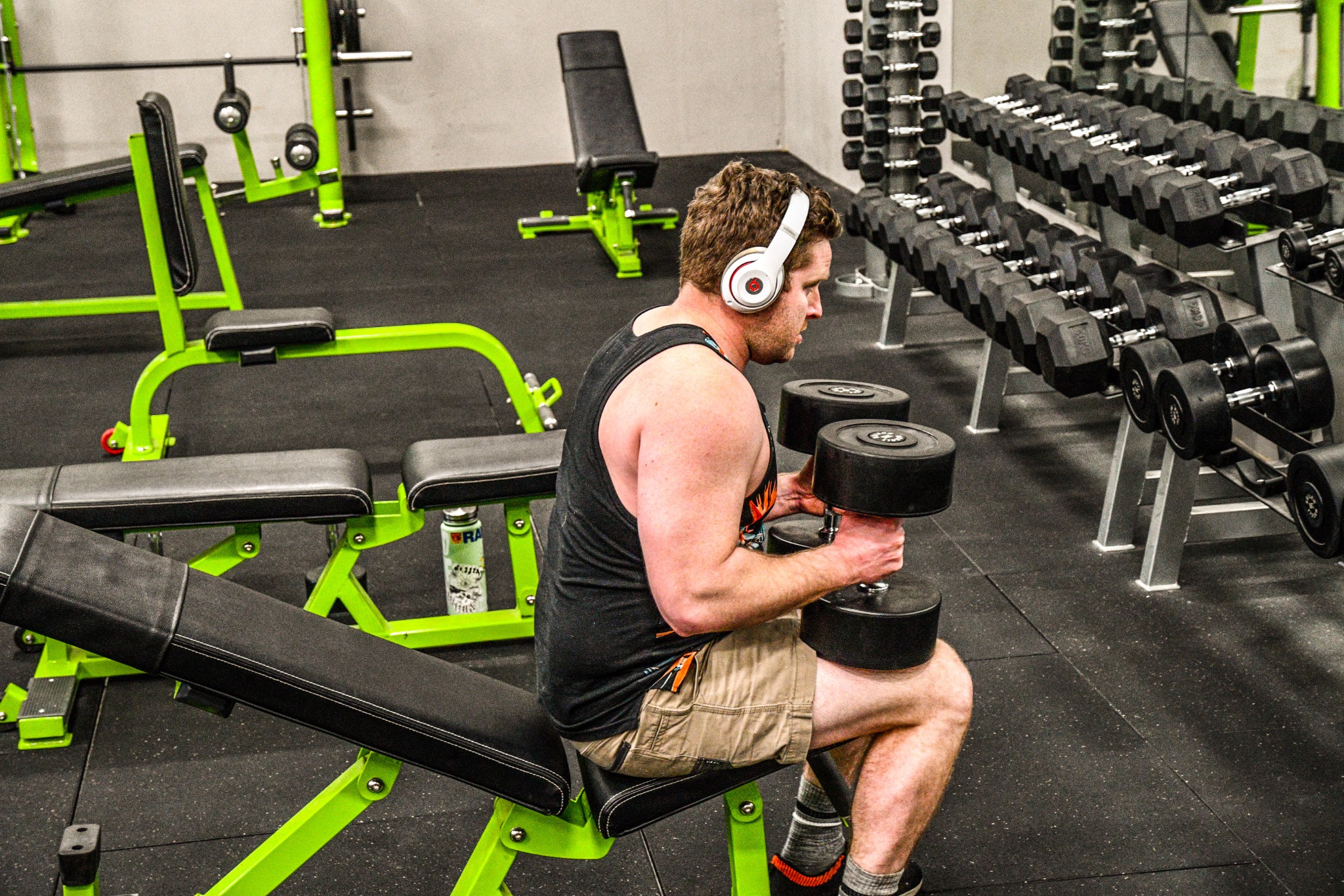 A gym member using dumbbells at Lifechoice Fitness